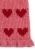Laula Sweater Heart – detal dolnej części różowej dzianiny, czerwonych serc i wykończenia brzegu swetra.