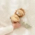 Little Dutch Ring Rattle Yellow – grzechotka z lwem w dłoni