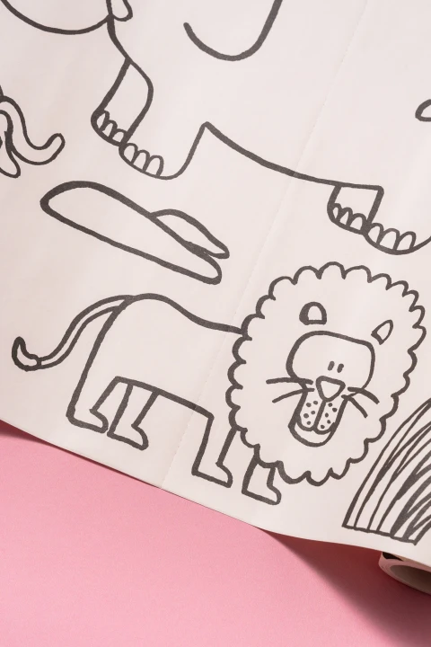 Bazgrolka Zwierzęta: perforacja papieru i ilustracja lwa