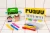 PUQUU Magic Glass Crayons - pudełko obok zestawu Face Paint