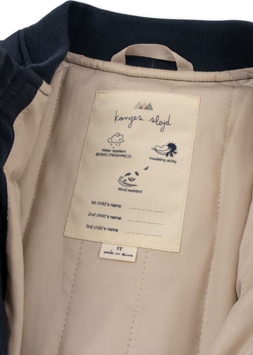 Metka i skład kurtki Konges Sløjd Juno Bomber Jacket