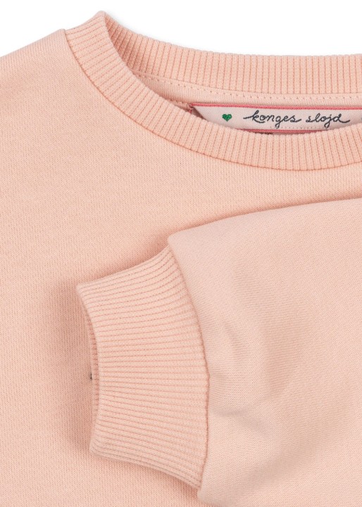 Miękka dzianina z 90% bawełny organicznej OCS w bluzie dziecięcej Konges Sløjd.