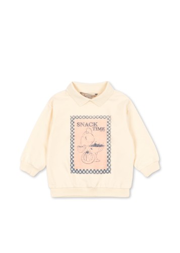 Koszulka polo dziecięca Konges Sløjd Spotty LS GOTS w kolorze Buttercream z 100% bawełny organicznej.