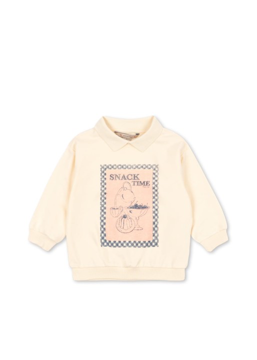 Koszulka polo dziecięca Konges Sløjd Spotty LS GOTS w kolorze Buttercream z 100% bawełny organicznej.