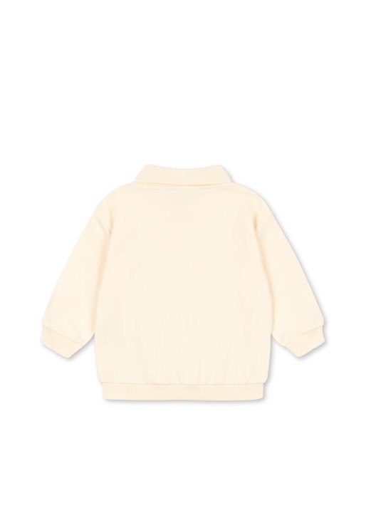 Tył koszulki polo dziecięcej Konges Sløjd Spotty LS GOTS Buttercream.