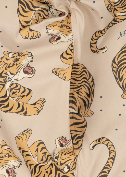 Wzór tygrysów Panthera Beige na odzieży przeciwdeszczowej Konges Sløjd