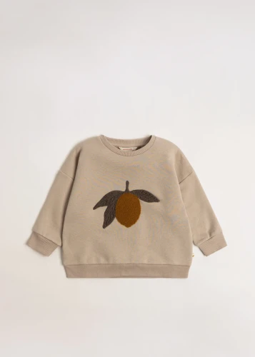 Konges Sløjd Lou Terry Oxford Tan Lemon – beżowa bluza dziecięca z aplikacją cytryny