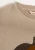 Lou Terry Oxford Tan Lemon – okrągły dekolt i fragment aplikacji