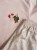 Famo Box Fit Pirouette Dot Creole Pink detal koszulki i spodenek