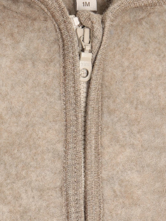 HUTTEliHUT Pram Suit Wool Fleece Savannah Melange – detal zamka i melanżowej faktury