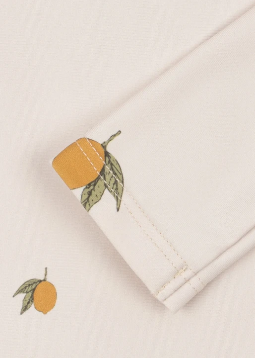 Konges Sløjd Aster Onesie Mon Grand Citron detal cytrynowego wzoru