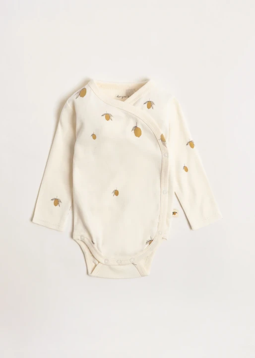 Konges Sløjd Newborn Body GOTS Lemon – kopertowe body niemowlęce